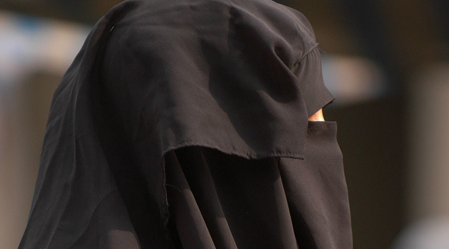 ‘Embarrassing’ anti-burqa posters add fuel to fire in Swiss naturalization debate