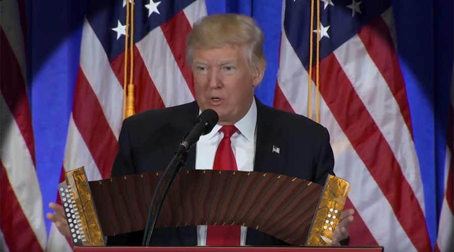 Trump ‘plays’ accordion while discussing Russian hacking & Mexico wall in satirical video