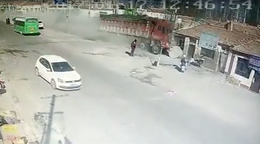 Dramatic CCTV footage shows moment speeding truck crashes into row of houses, killing 5