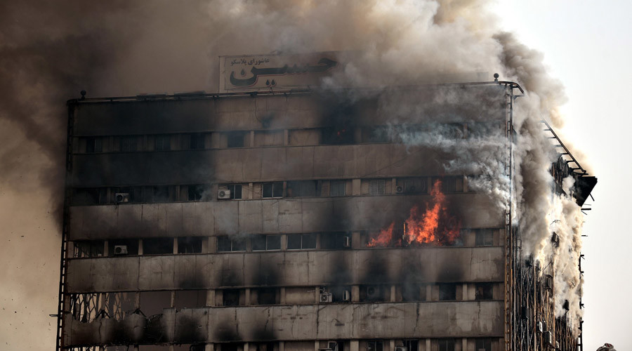 ‘Like a horror movie’: at least 20 feared dead after blaze topples Tehran’s oldest high-rise