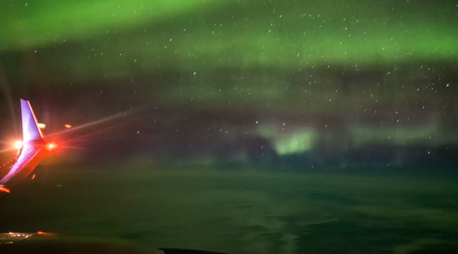 Ethereal Northern Lights captured from 35,000ft by airplane passenger (VIDEO)