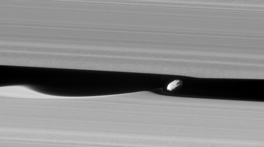 NASA’s Cassini craft captures Saturn’s ‘wavemaker’ moon like never before (PHOTOS)