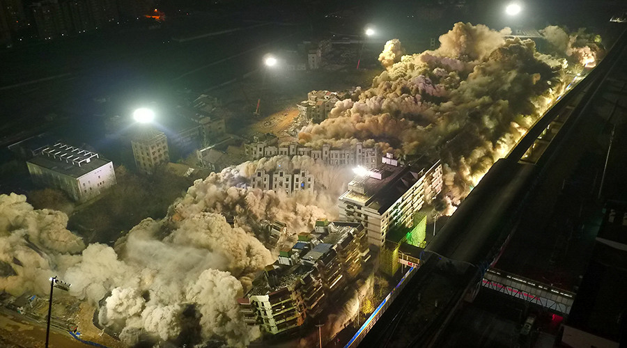 19 buildings, 10 sec, & 5 tons of TNT: Epic demolition in central China (VIDEO)