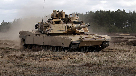 Members of the U.S. 2nd Battalion, 7th Infantry Regiment, 1st Brigade Combat Team, 3rd Infantry Division ride an Abrams tank during an exercise at Mielno range near Drawsko-Pomorskie. File photo.© Kacper Pempel