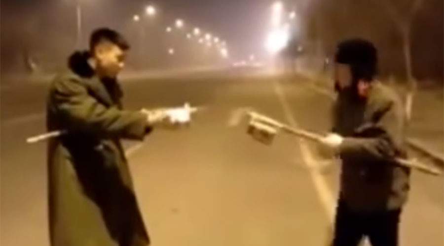 Sparks fly as fireworks fight erupts on street in explosive video