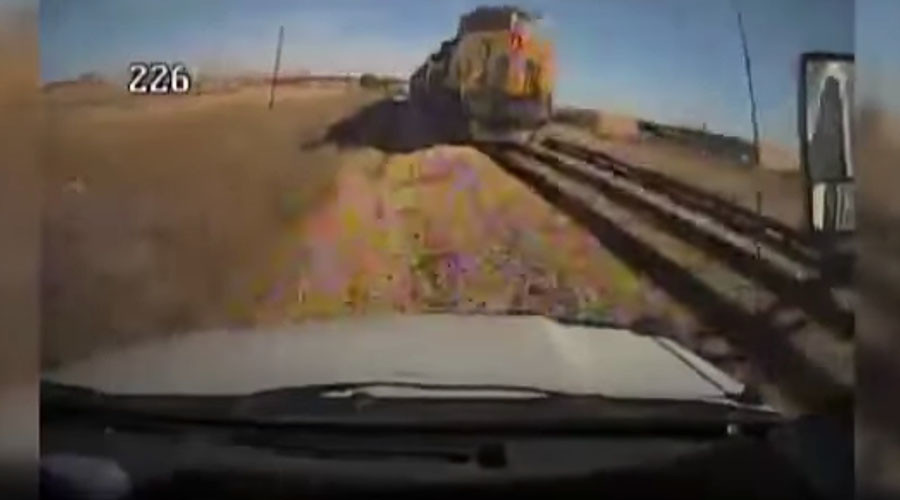 Horrifying collision of train & bus captured on camera (GRAPHIC VIDEO)