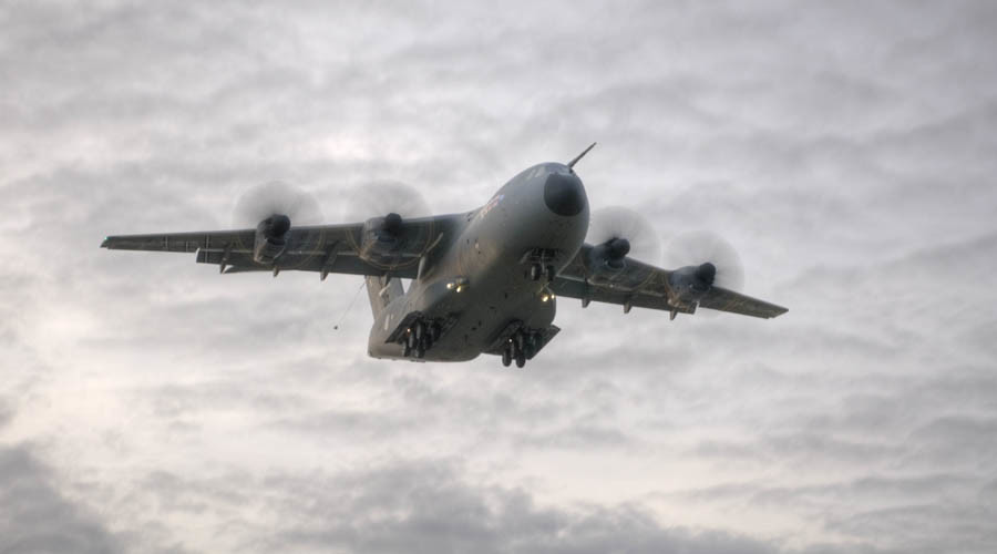 Rock blocked: Gibraltar police car speeds onto runway to stop RAF plane from taking off