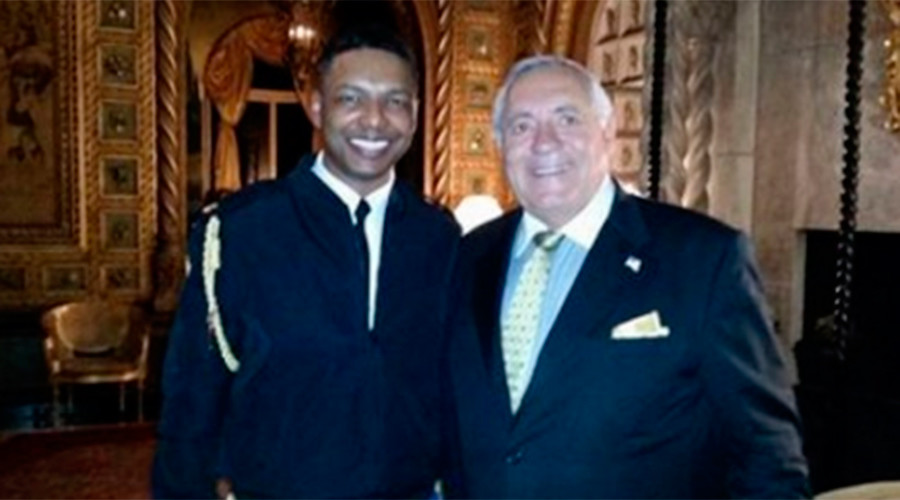 Trump guest sparks security concerns after posing with 'nuclear football' at dinner with Abe