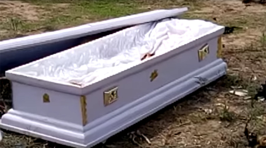 Grave situation: Corpse seized during funeral after family fail to pay fees (GRAPHIC VIDEOS)