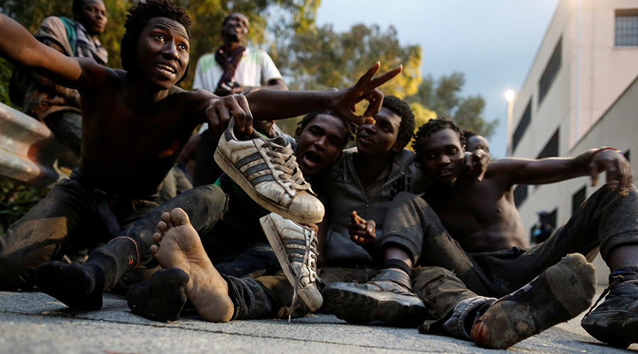 ‘Freedom! Victory!’ 500 African migrants celebrate after breaking through EU border fence (VIDEO)