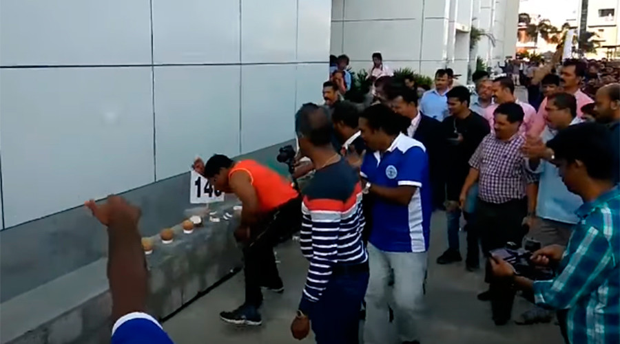 Indian man smashes 124 coconuts in 50 seconds with bare hands (VIDEO)