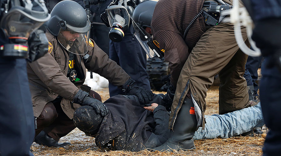 Police & military clear DAPL protest camp, dozens arrested, protesters start fires (PHOTOS)