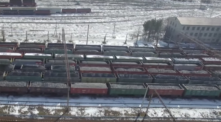 Drone captures endless lines of coal cars held up by blockade of rebel E. Ukraine (VIDEO)