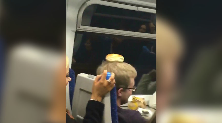 Mass drunken brawl on British train sparked by bagel (VIDEO)