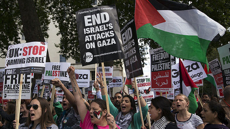 FILE PHOTO: Pro-Palestinian protesters chant during a demonstration against violence in the Gaza, London. © Neil Hall
