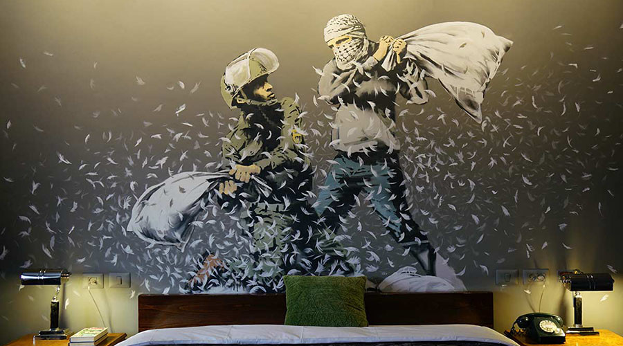 Banksy’s Bethlehem hotel offers room with a view of West Bank barrier (PHOTOS)
