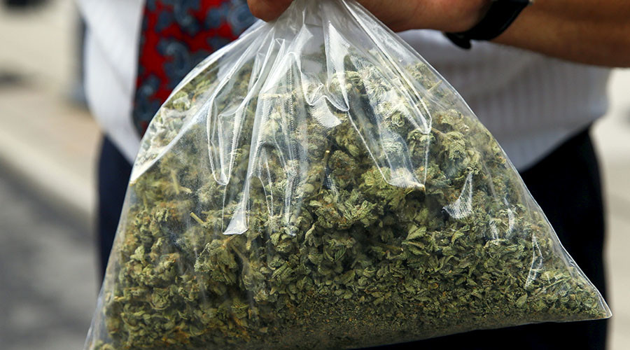 Drug dealer caught handing dope to co-defendant… during their trial