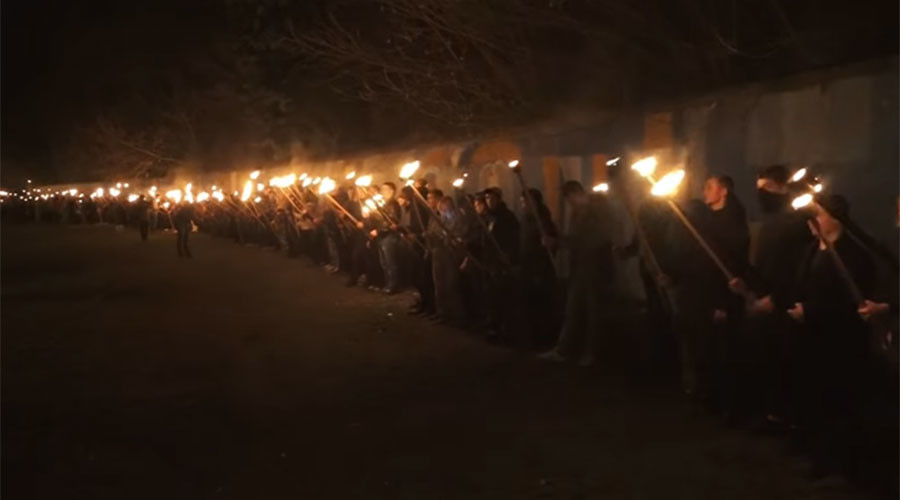 Ukrainian nationalists honor Nazi collaborator & other ‘fallen heroes’ with torch-lit march (VIDEO)