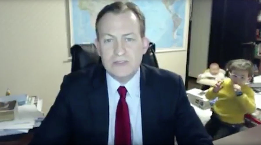 Curious kids gatecrash BBC news pundit’s live interview with perfect comic timing (VIDEO)