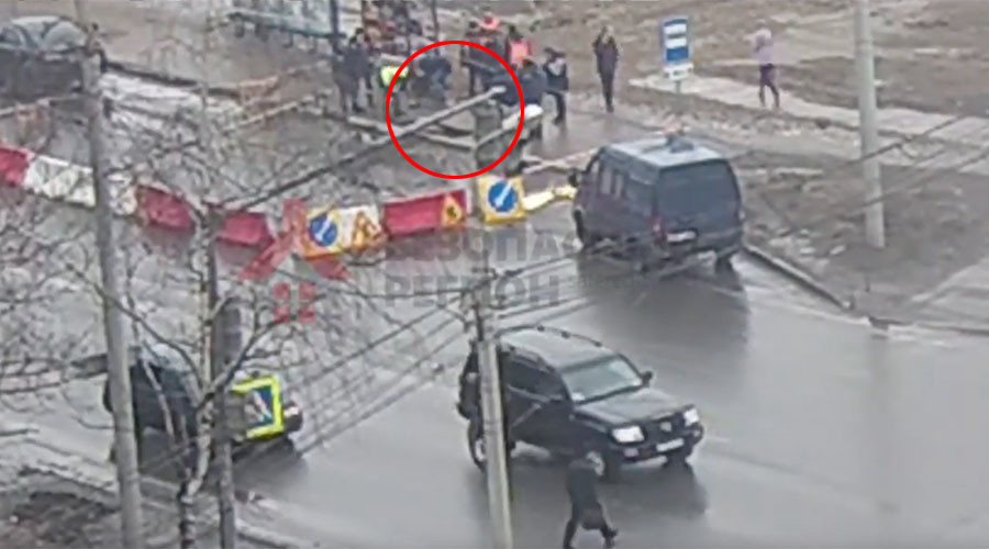 Russian road swallows man waiting for trolleybus (VIDEO)
