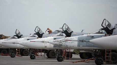  Russian Sukhoi Su-24 planes at the Khmeimim airbase in Syria. © Maksim Blinov