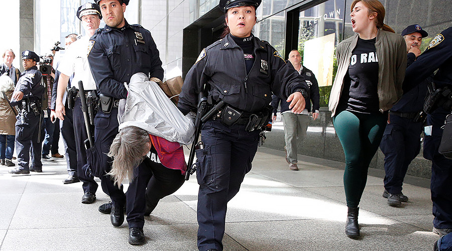 ‘No raids, no bans, no wall’ yell protesters arrested after staging sit-in Trump Tower