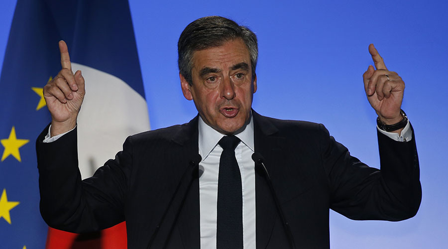 French presidential hopeful Fillon calls for suspension of campaign activities after Paris shooting