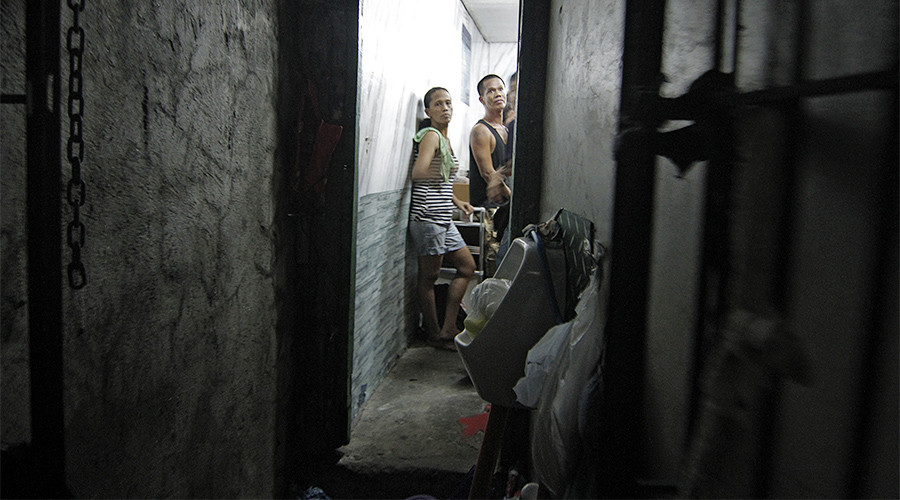 ‘Begging for water’: Secret cell behind bookshelf exposed at Philippines police station (PHOTOS)