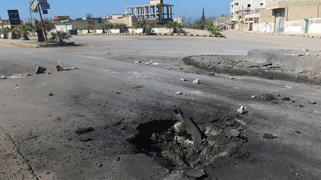 A crater is seen at the site of an airstrike, after what rescue workers described as a suspected gas attack in the town of Khan Sheikhoun in rebel-held Idlib, Syria April 4, 2017. © Ammar Abdullah