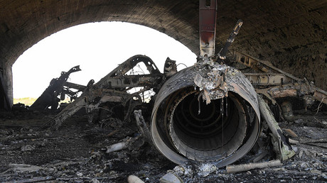 The body of a plane burned as a result of the US missile attack on an air base in Syria. © Mikhail Voskresenskiy