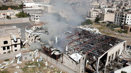 Smoke rises from the community hall where Saudi-led warplanes struck a funeral in Sanaa, the capital of Yemen, October 9, 2016. © Khaled Abdullah