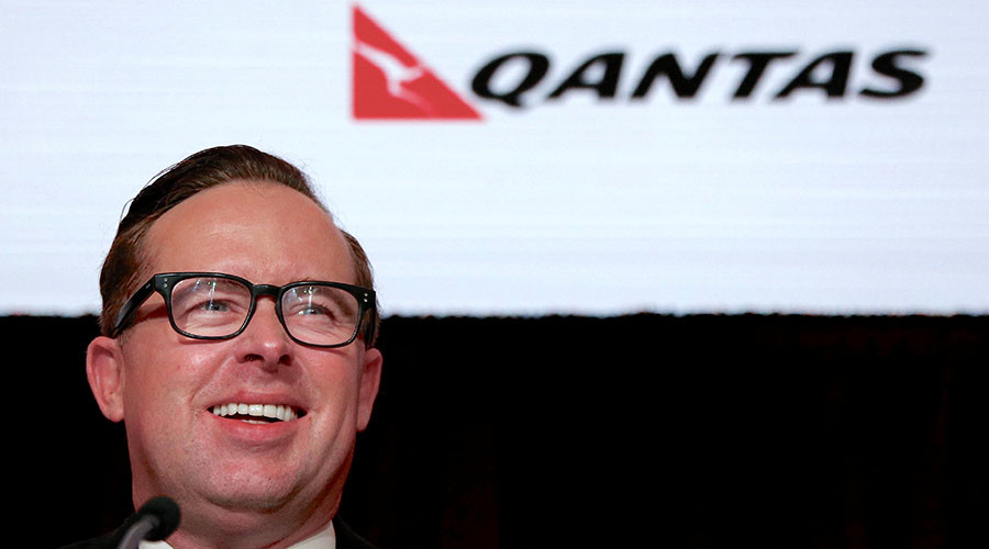 Qantas CEO gets smashed in face with massive cream pie (VIDEO)