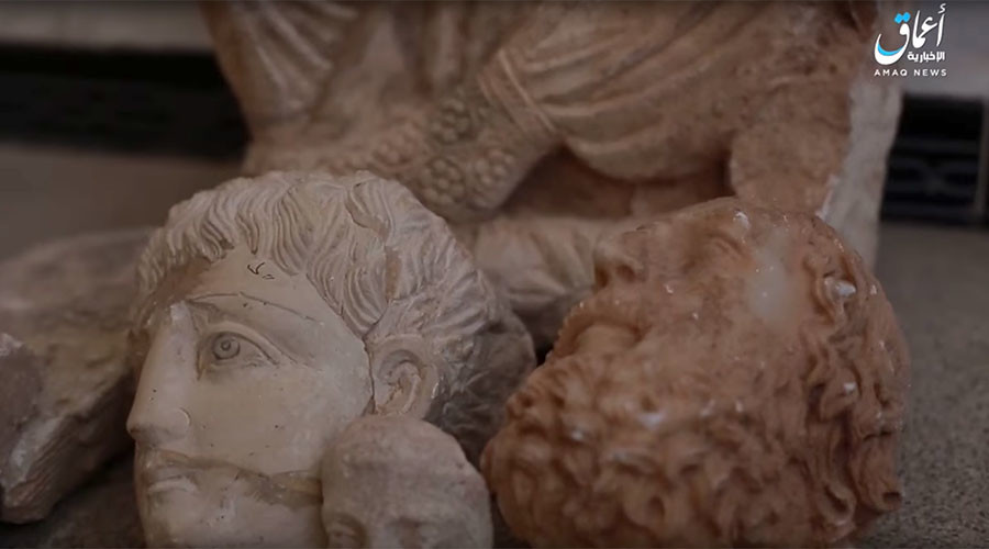 ISIS destroys ancient artefacts as campaign against Syrian heritage sites continues (VIDEO)