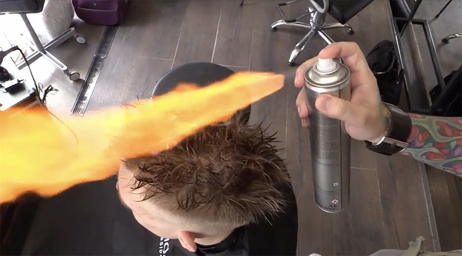 Flame-throwing Russian barber sets client’s hair alight in name of fashion (VIDEO)