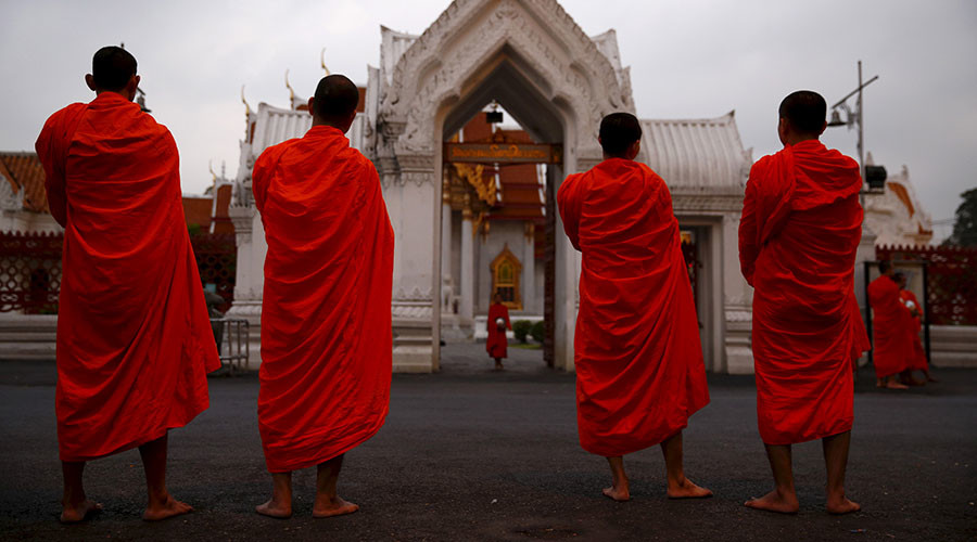 ‘Buddhist monk’ watching x-rated film on bus goes viral