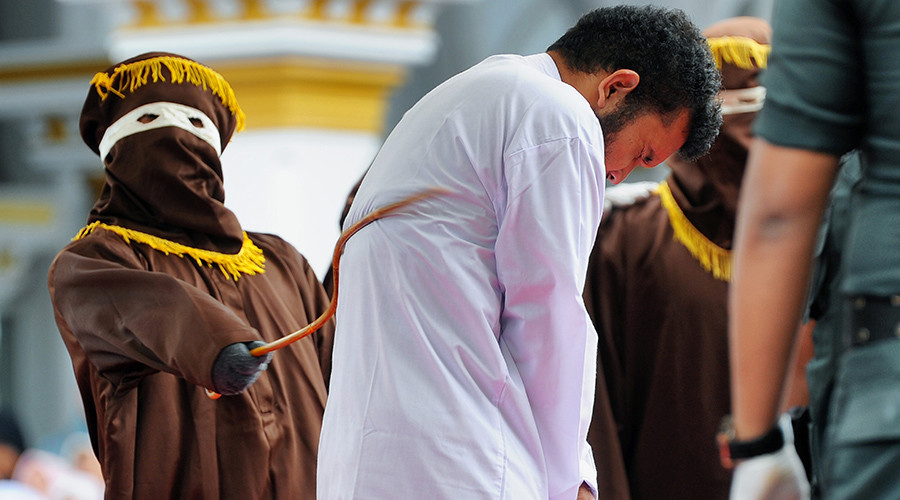 Gay pair caned in Indonesia as crowd cheers & takes pictures