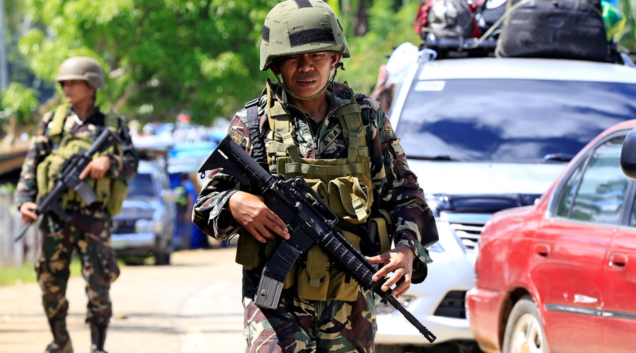 Gunmen take priest, churchgoers hostage in Philippines, vow to kill captives