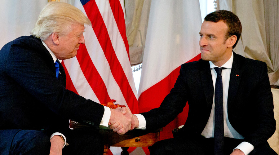 Trump & Macron engage in fierce handshake battle during first meeting (VIDEO)