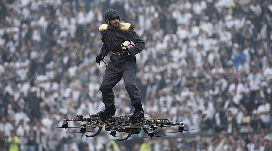 Man on drone delivers soccer ball to stadium in dramatic stunt (VIDEO)