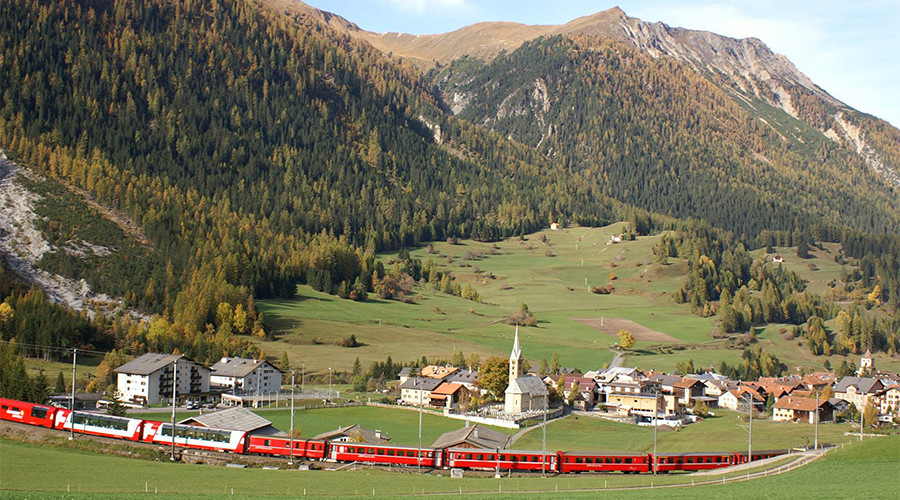 Don’t say cheese! Swiss village bans photos of scenery to avoid upsetting people who can’t visit