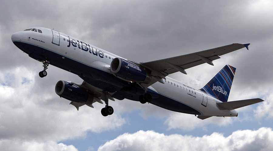 Flight diverted after fire in passenger's electronic device