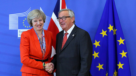 British Prime Minister Theresa May (L) and European Commission President Jean-Claude Juncker. © Yves Herman