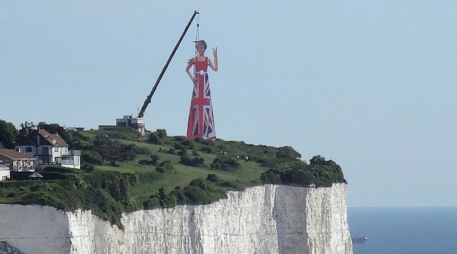 Massive effigy of Theresa May flipping V-sign at Europe erected on White Cliffs of Dover