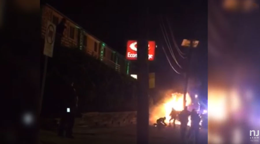 New Jersey cop kicks burning car crash victim in head (VIDEO)