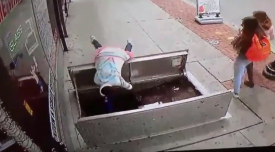 Woman distracted by phone tumbles through sidewalk trapdoor in horror fall (VIDEO)