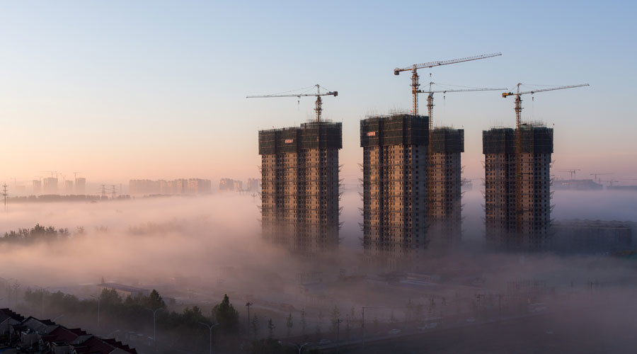 IMF urges China to cut ballooning debt faster