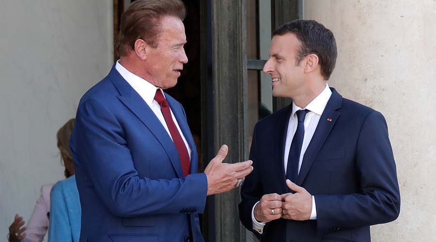Posse politics: Schwarzenegger & Macron join forces to troll Trump (VIDEO)