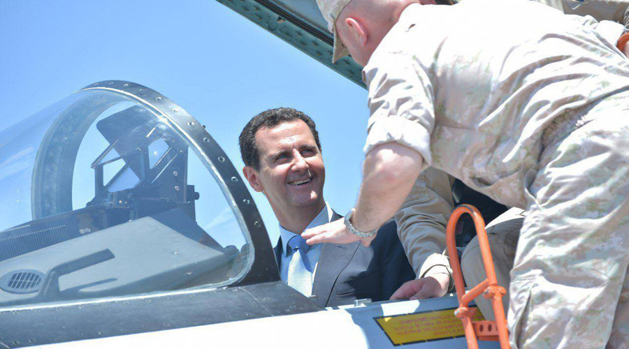 Syria’s Assad tries out role of Su-35 fighter jet pilot at Russia’s Khmeymim airbase (PHOTOS, VIDEO)
