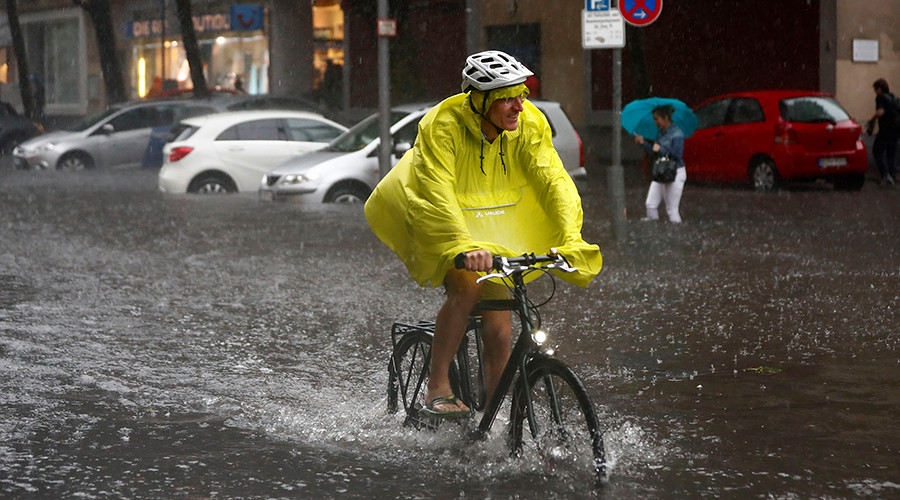 Monster storm batters Berlin: Cyclists persevere, surfers thrive (VIDEOS PHOTOS)