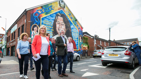 Sinn Fein leader Michelle O'Neill and party president Gerry Adams walk outside the Sinn Fein offices in Belfast, Northern Ireland, June 9, 2017. © Liam McBurney 